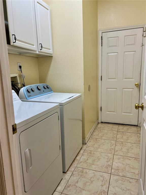 13367 Luxbury Loop Orlando, FL 32837 - Photo 45 of 49 a utility room with dryer and washer