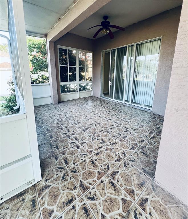 13367 Luxbury Loop Orlando, FL 32837 - Photo 46 of 49 wooden floor in an empty room with a window