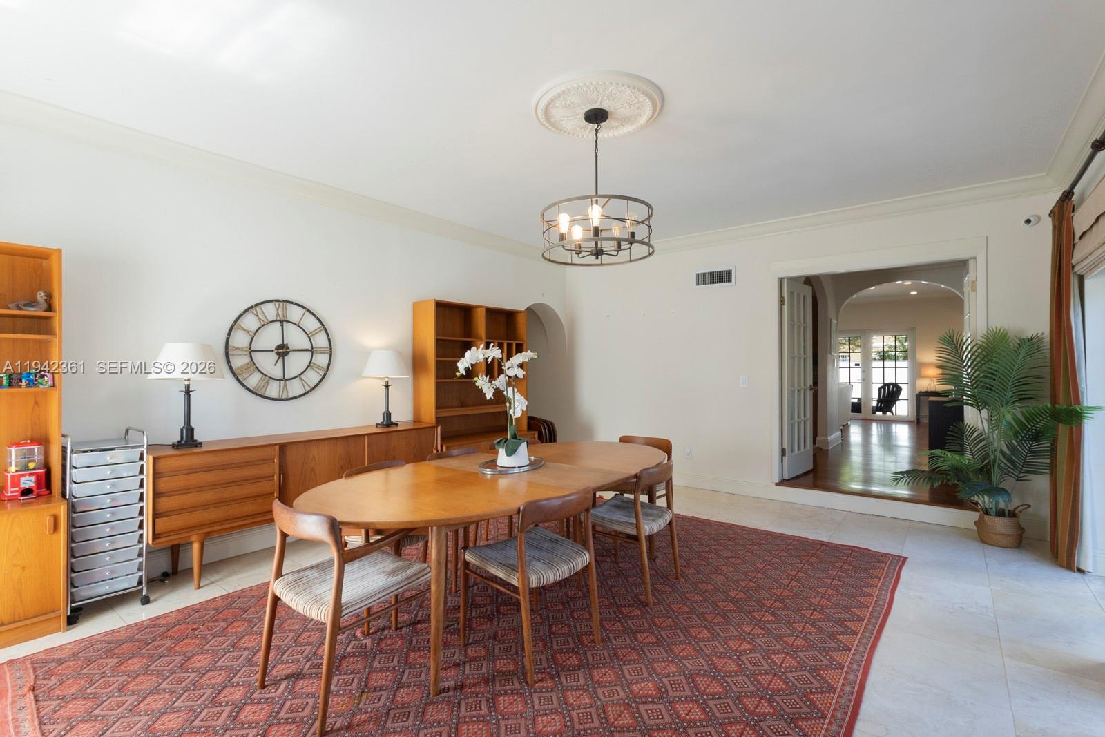 360 Southwest 28th Road Miami, FL 33129 - Photo 13 of 41 a view of a dining room with furniture