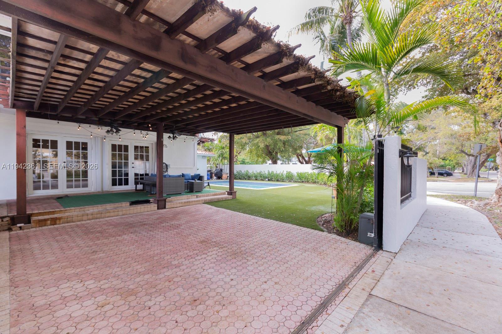 360 Southwest 28th Road Miami, FL 33129 - Photo 23 of 31 a view of a porch with furniture and garden