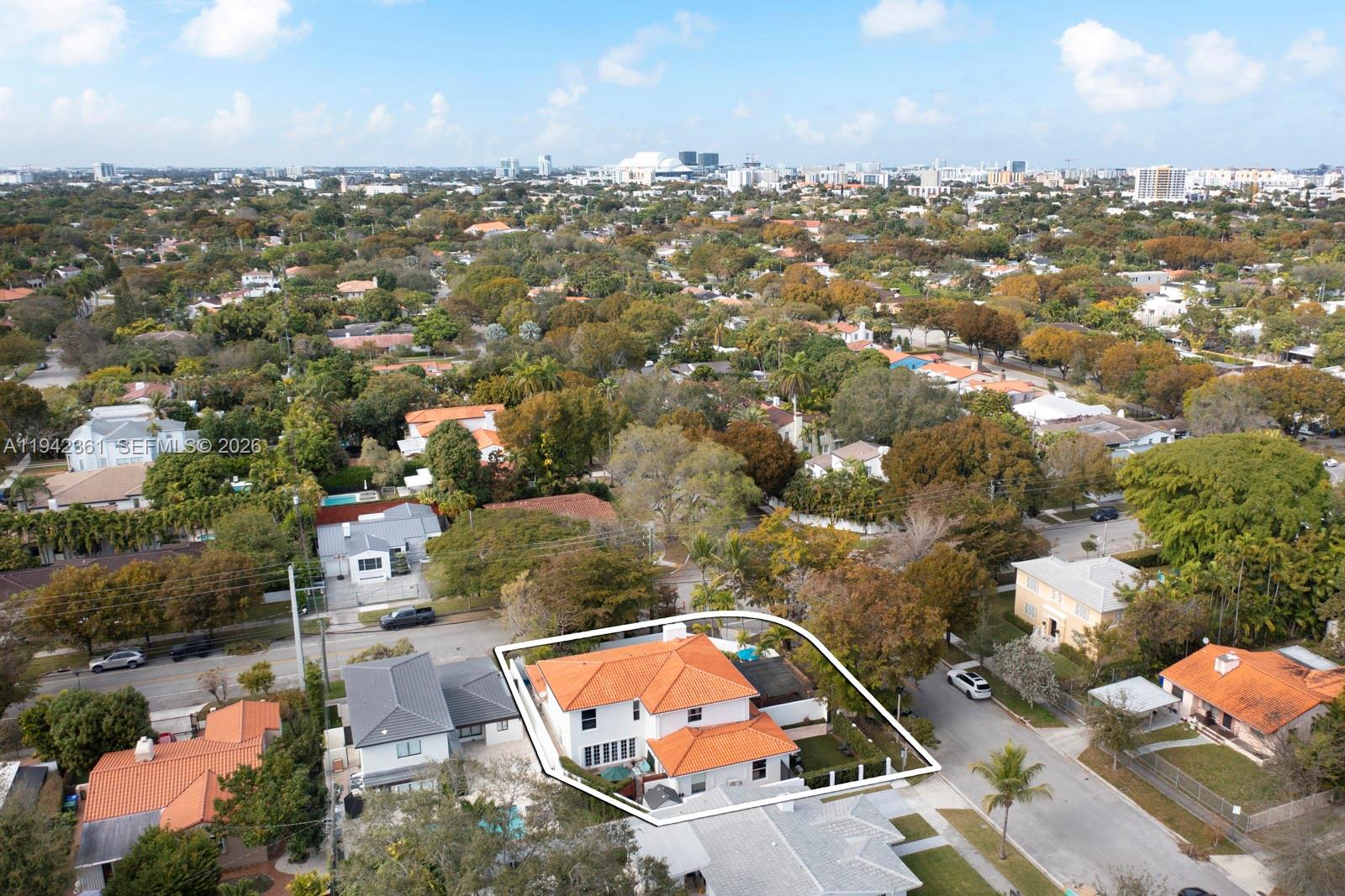 360 Southwest 28th Road Miami, FL 33129 - Photo 30 of 31 an aerial view of a house with a yard
