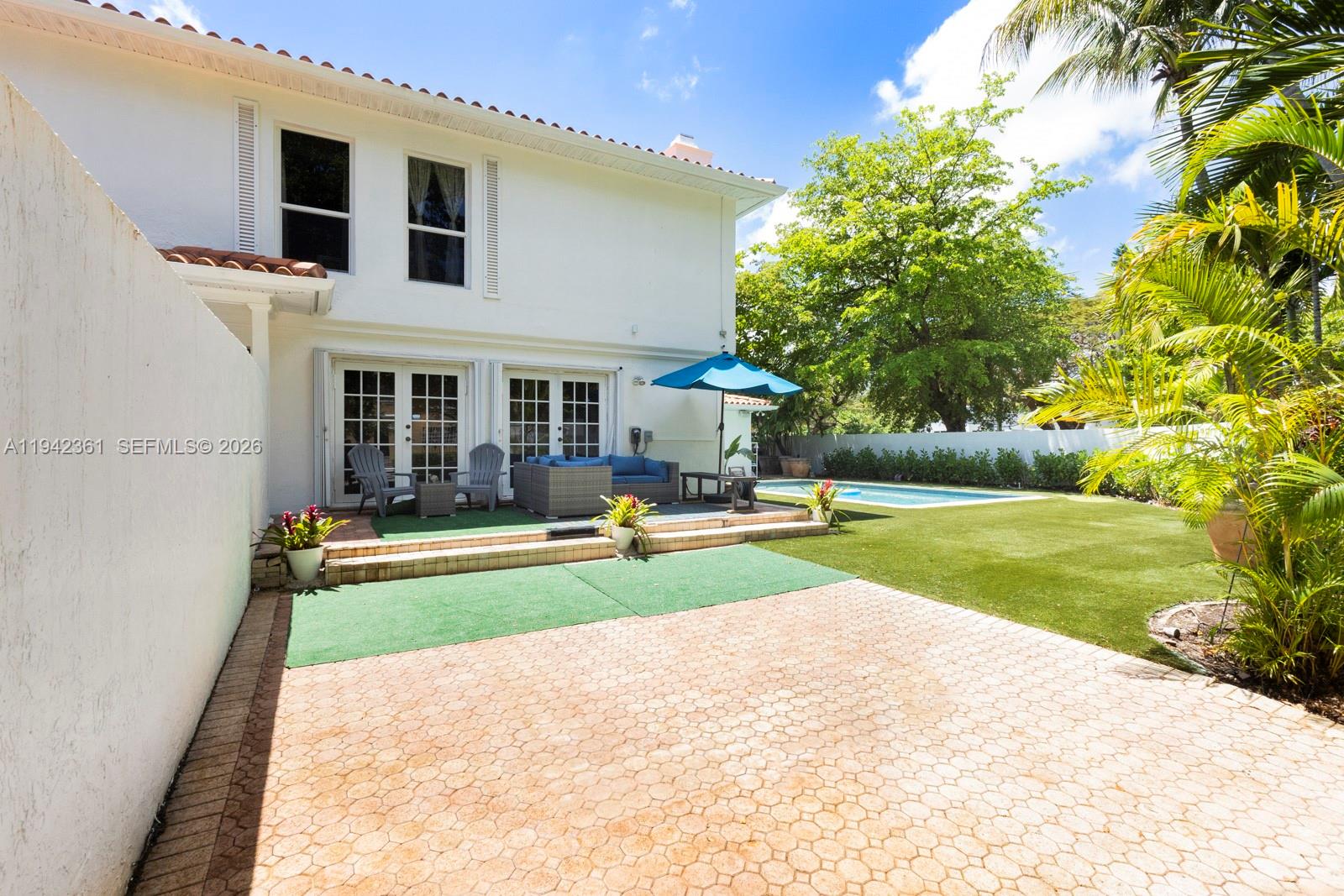 360 Southwest 28th Road Miami, FL 33129 - Photo 31 of 41 a view of outdoor space yard swimming pool and porch