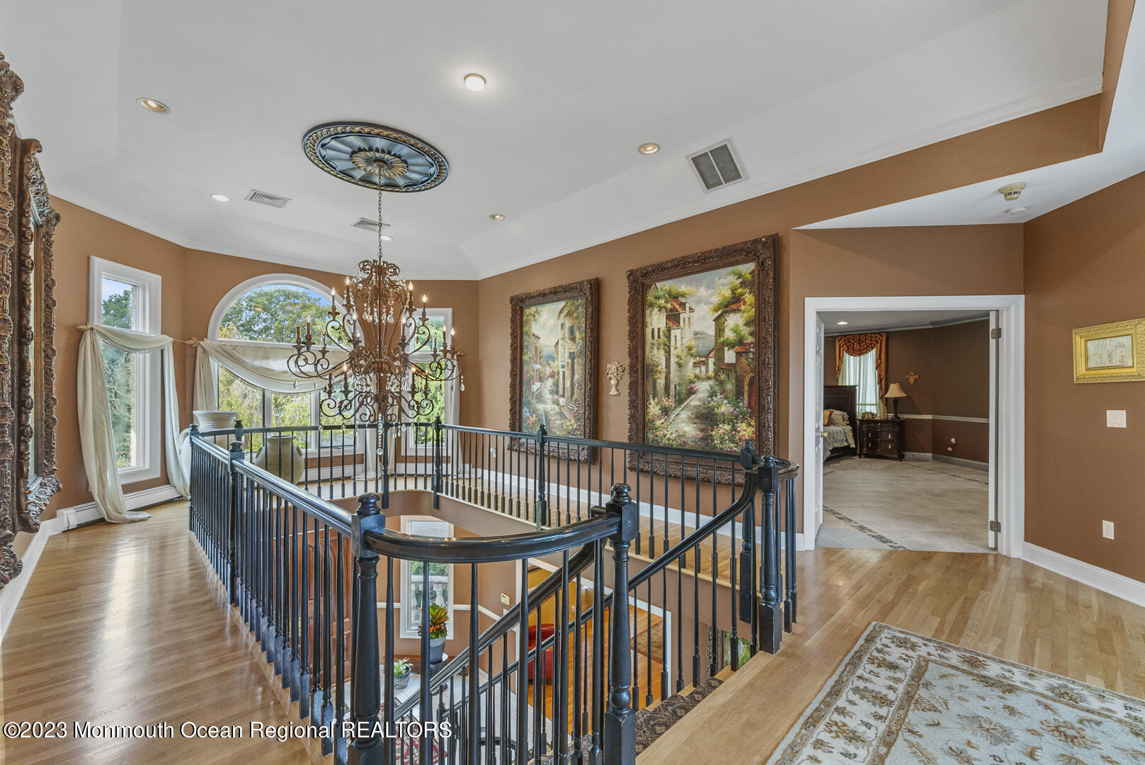 8 Applegate Terrace Manalapan, NJ 07726 - Photo 26 of 36 a view of staircase with furniture and a large window