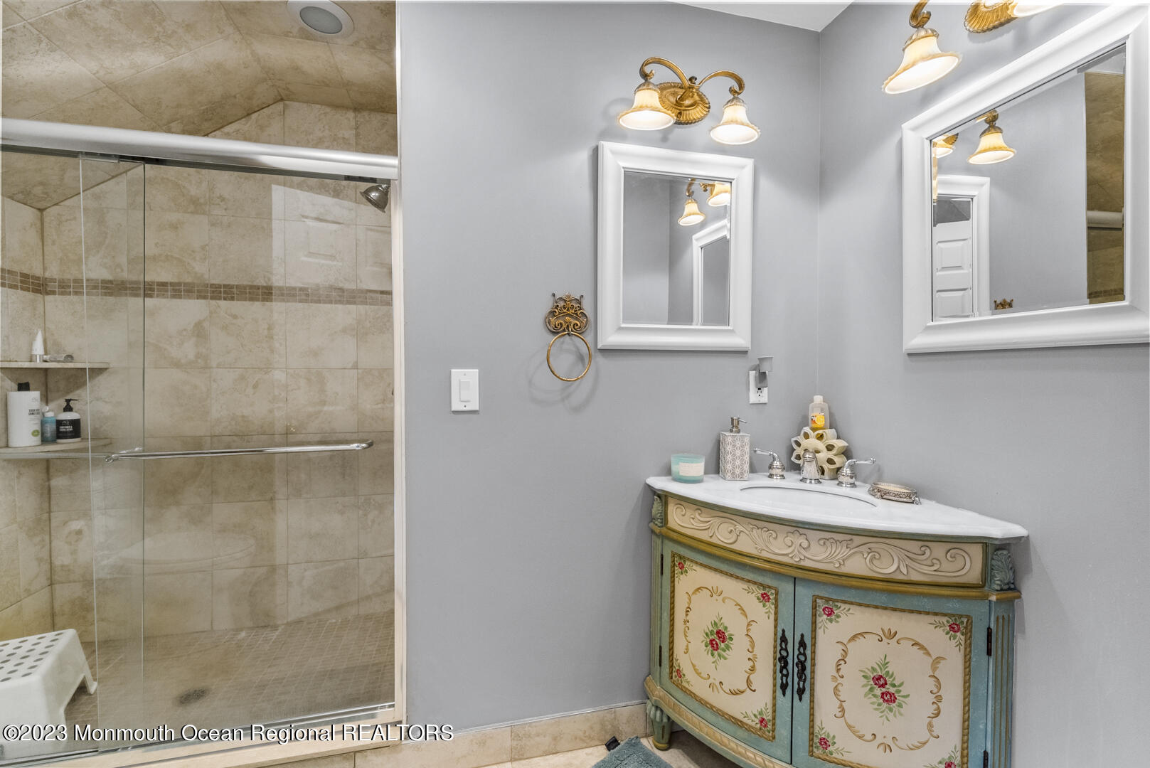 8 Applegate Terrace Manalapan, NJ 07726 - Photo 31 of 36 a bathroom with a sink mirror and vanity