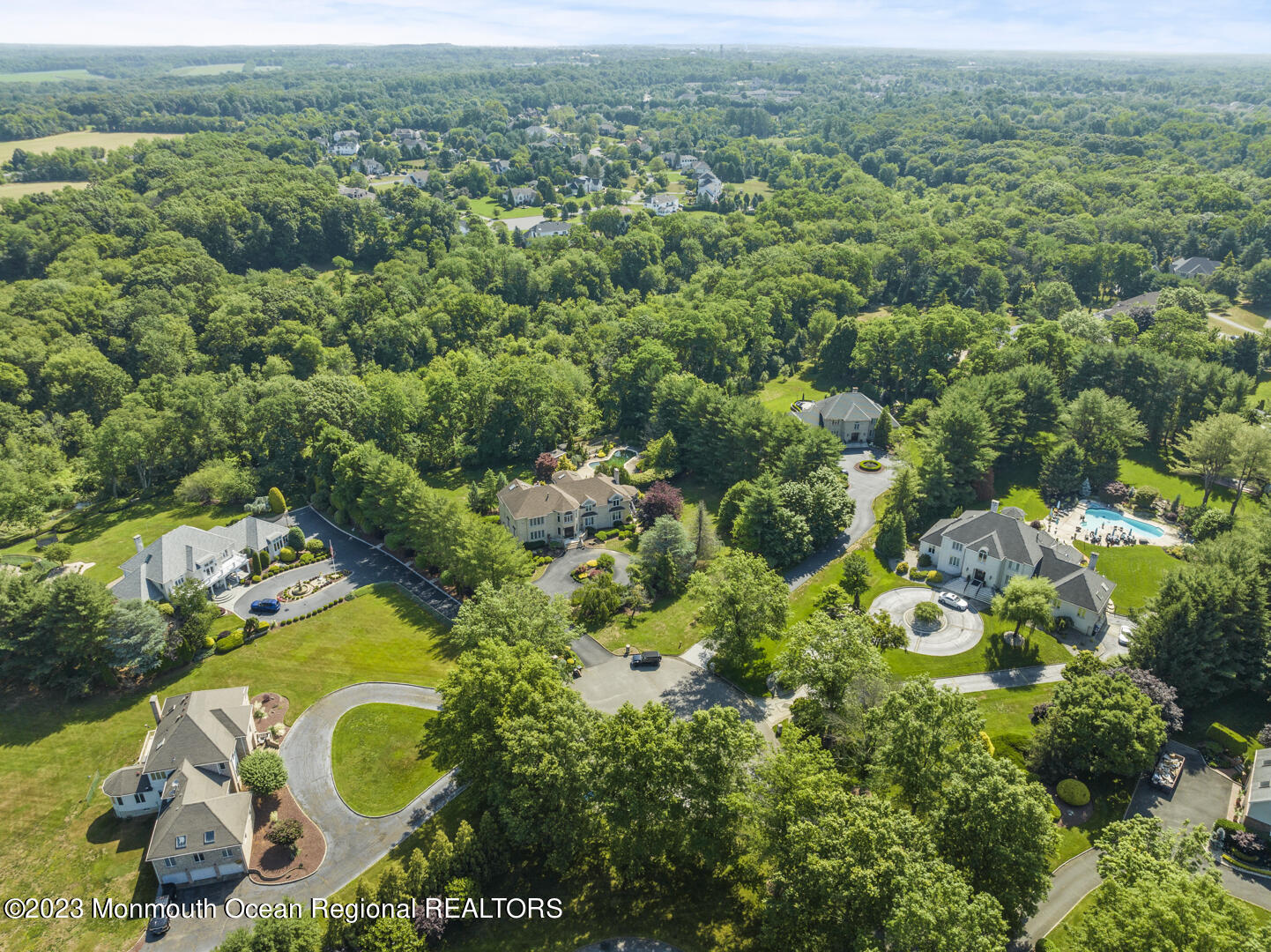 8 Applegate Terrace Manalapan, NJ 07726 - Photo 34 of 36 an aerial view of a house with a yard