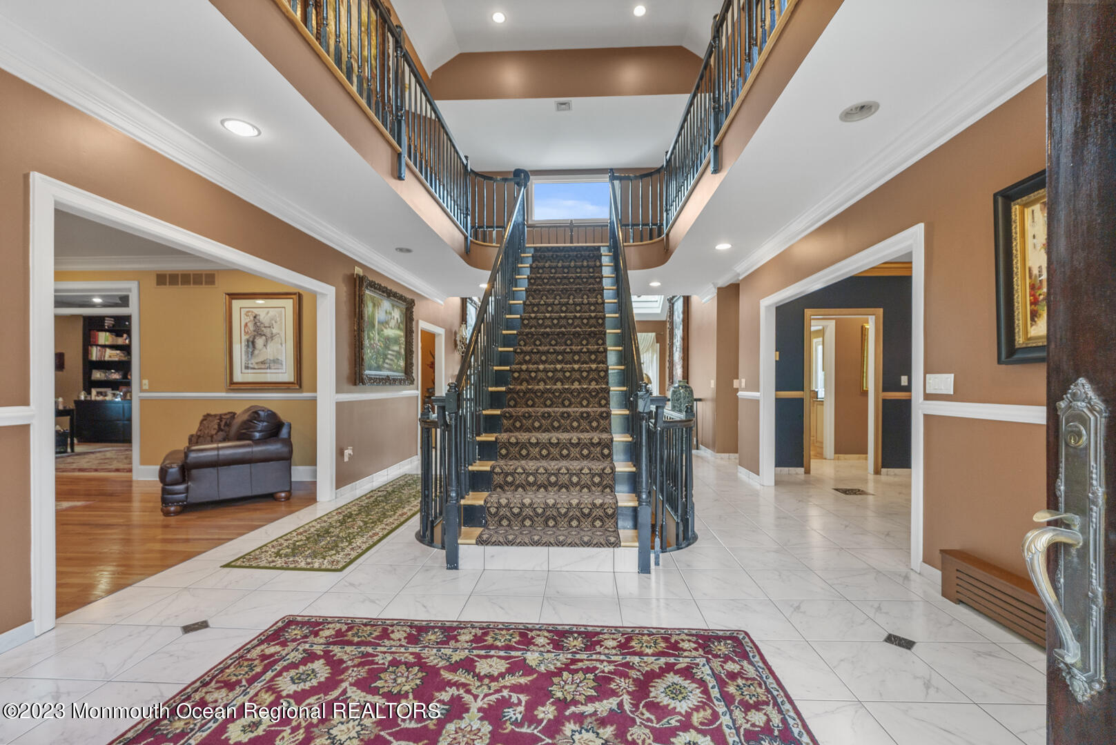 8 Applegate Terrace Manalapan, NJ 07726 - Photo 5 of 36 a view of entryway and hall with wooden floor