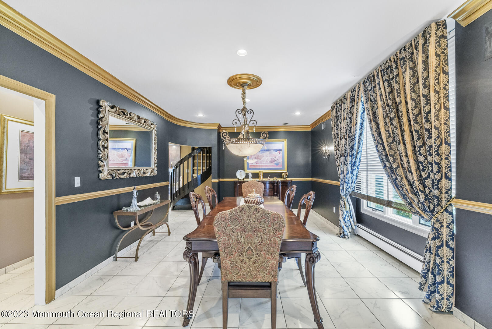 8 Applegate Terrace Manalapan, NJ 07726 - Photo 7 of 36 a dining room with furniture and wooden floor