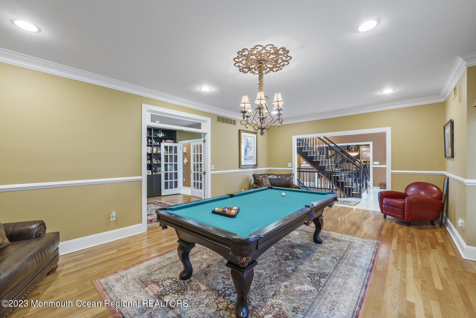 8 Applegate Terrace Manalapan, NJ 07726 - Photo 8 of 36 a room with pool table table and windows