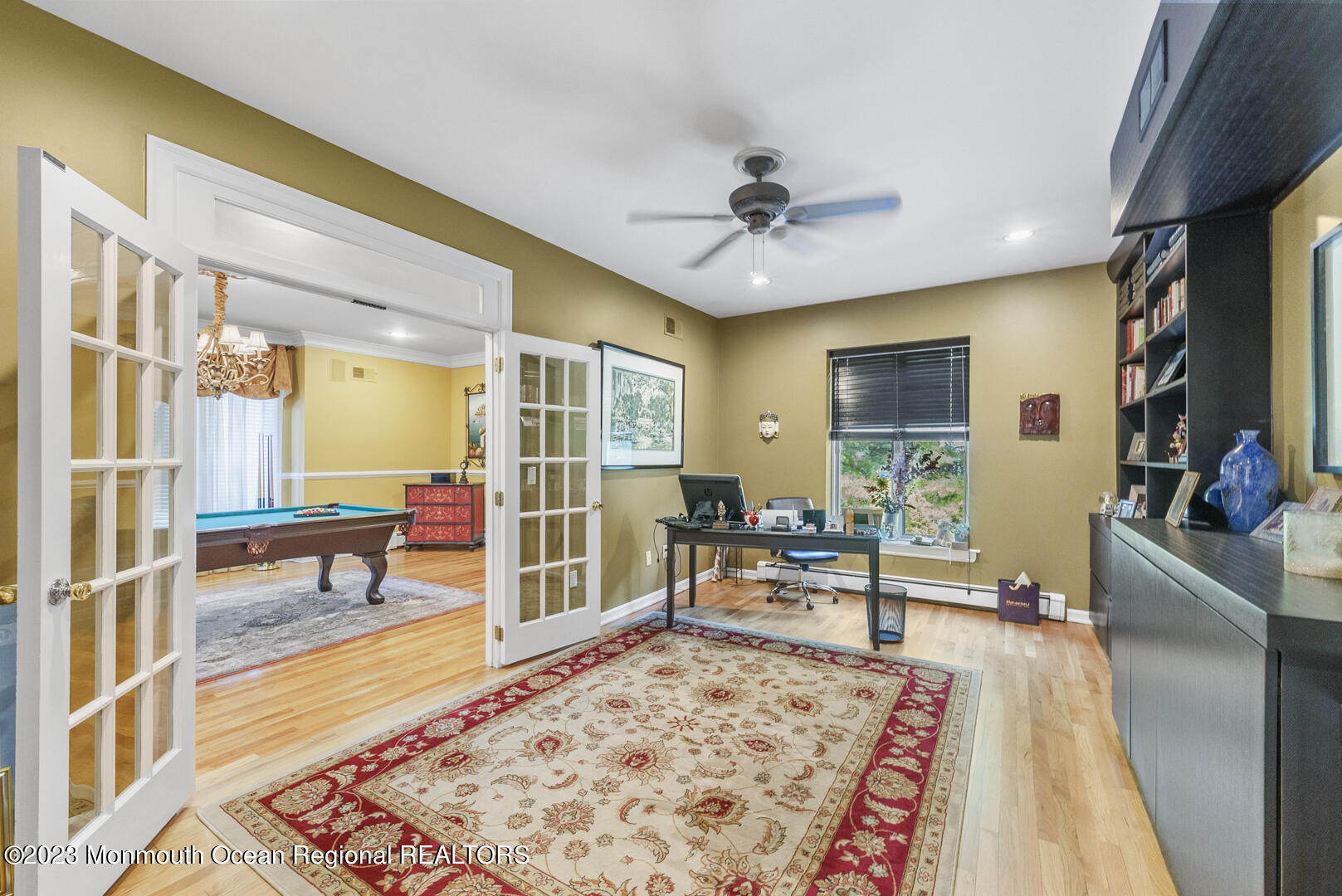 8 Applegate Terrace Manalapan, NJ 07726 - Photo 9 of 36 a living room with furniture and a rug