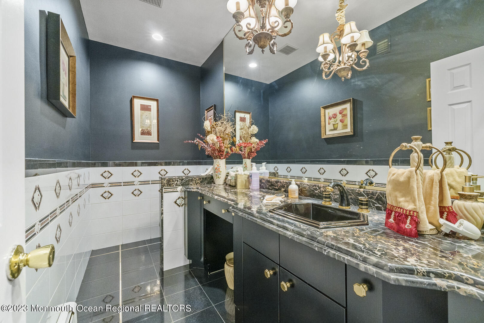 8 Applegate Terrace Manalapan, NJ 07726 - Photo 10 of 36 a bathroom with a sink double vanity granite and a mirror