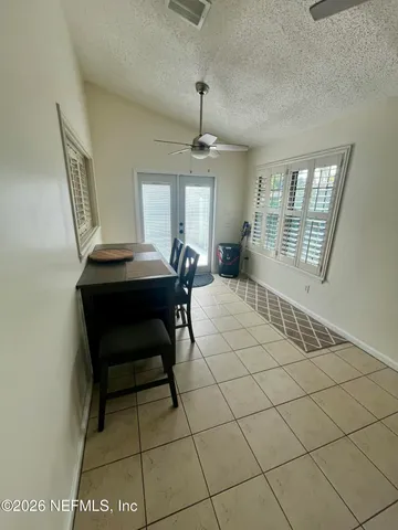 a view of a kitchen with a sink