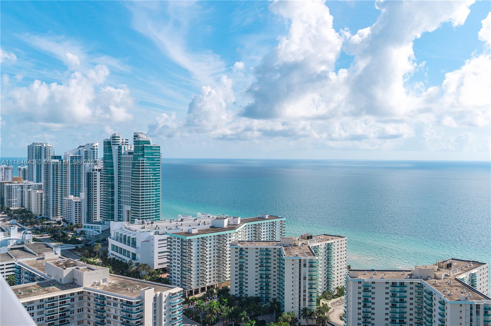 4010 South Ocean Drive, Unit R1405 Hollywood, FL 33019 - Photo 4 of 67 a view of a city with tall buildings