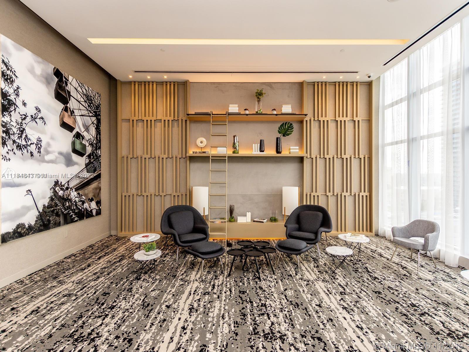 4010 South Ocean Drive, Unit R1405 Hollywood, FL 33019 - Photo 46 of 67 a view of a workspace with furniture and a window