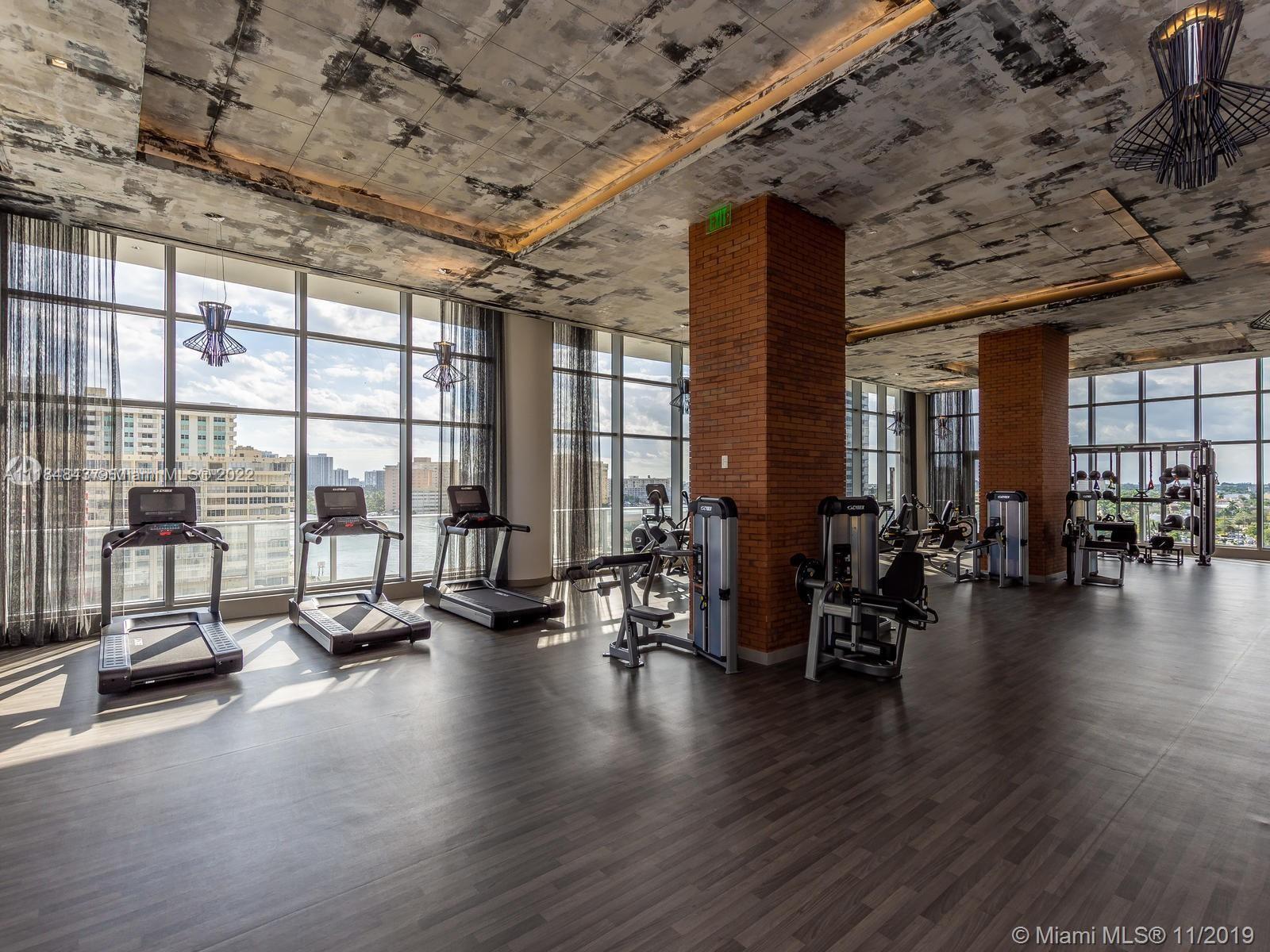 4010 South Ocean Drive, Unit R1405 Hollywood, FL 33019 - Photo 55 of 67 a view of a room with gym equipment