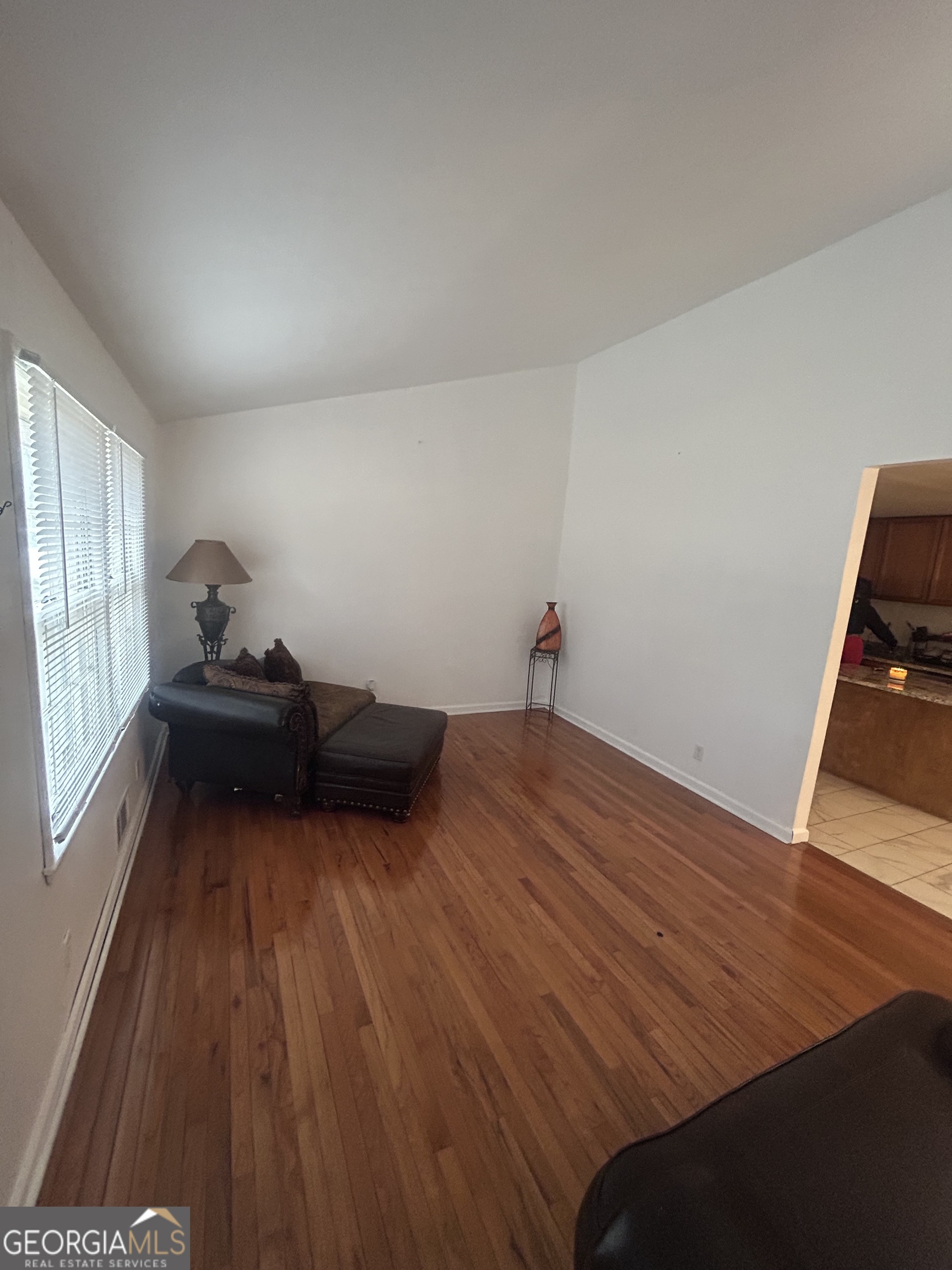 1406 Canterbury Road Griffin, GA 30223 - Photo 6 of 26 a bedroom with a bed and a window