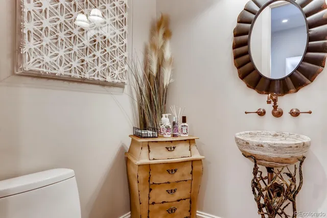 a bedroom with a bed and flat screen tv