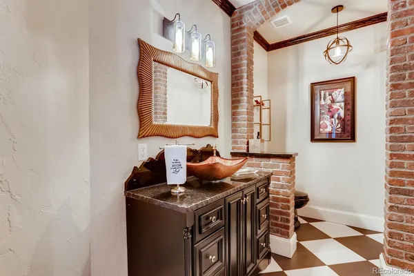 a bedroom with a large bed and a television