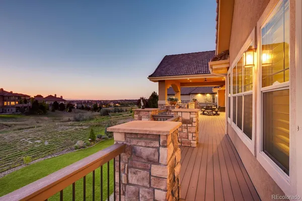 a view of a house with a backyard space