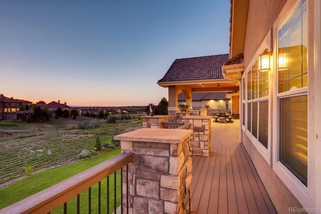 a view of a house with a backyard space