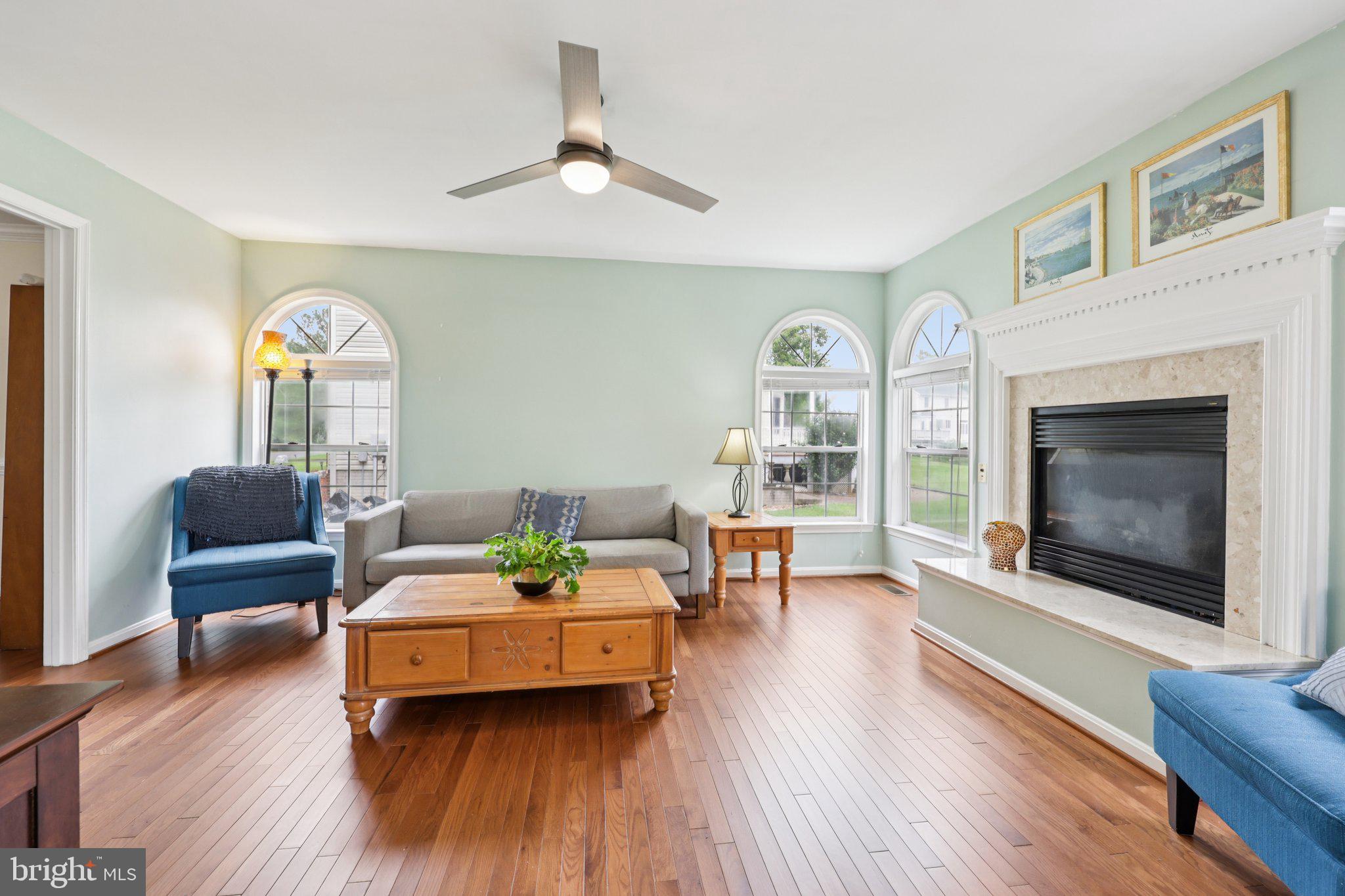 10457 Pineview Road Manassas, VA 20111 - Photo 13 of 55 a living room with furniture and a fireplace