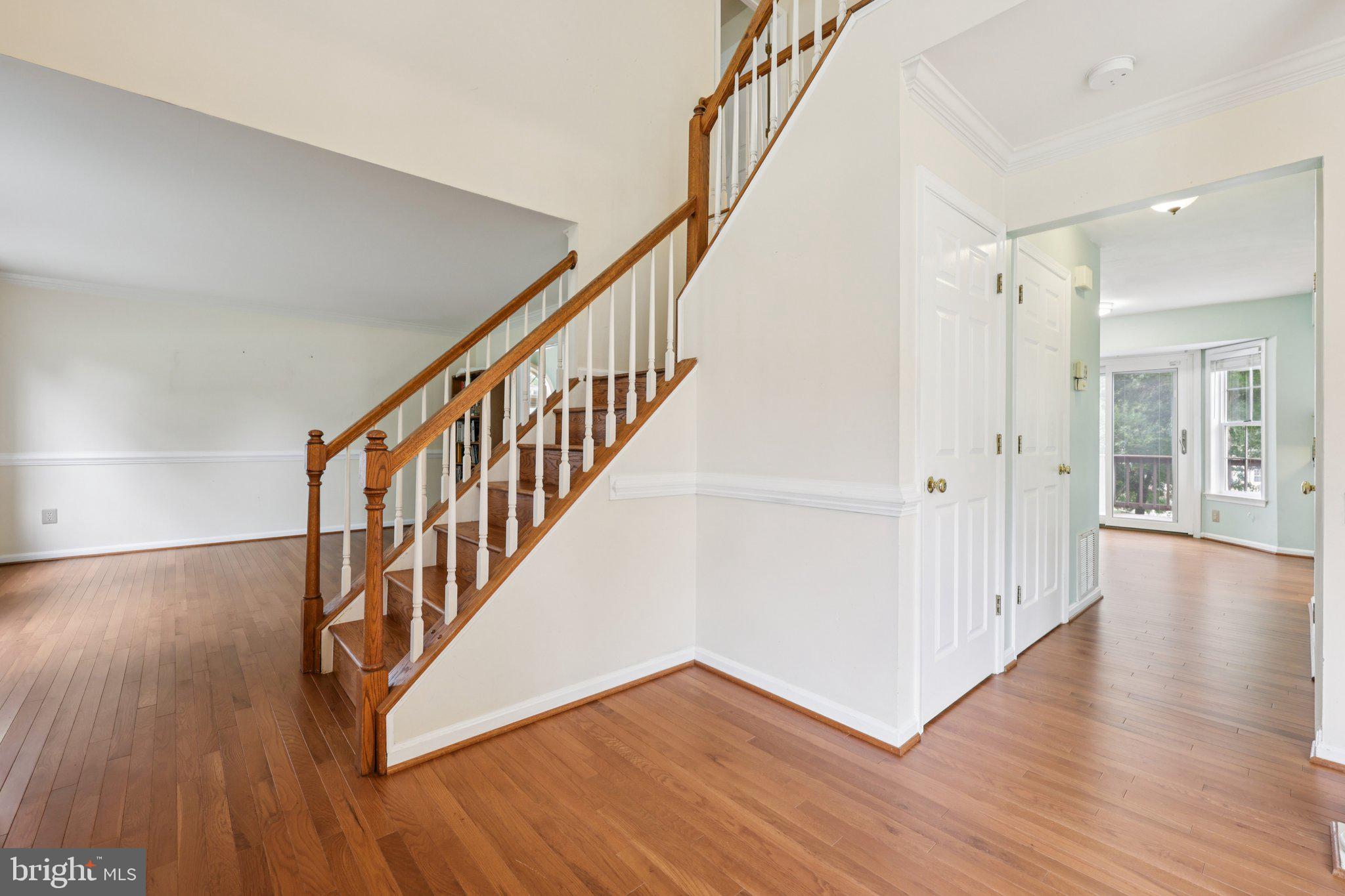 10457 Pineview Road Manassas, VA 20111 - Photo 2 of 55 a view of an entryway with wooden floor