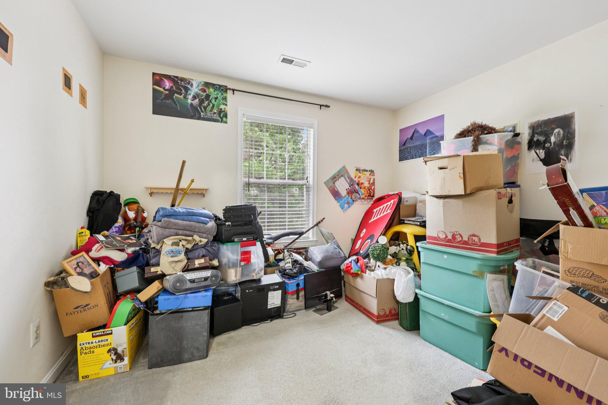 10457 Pineview Road Manassas, VA 20111 - Photo 26 of 55 a living room with lots of furniture and a gym equipment