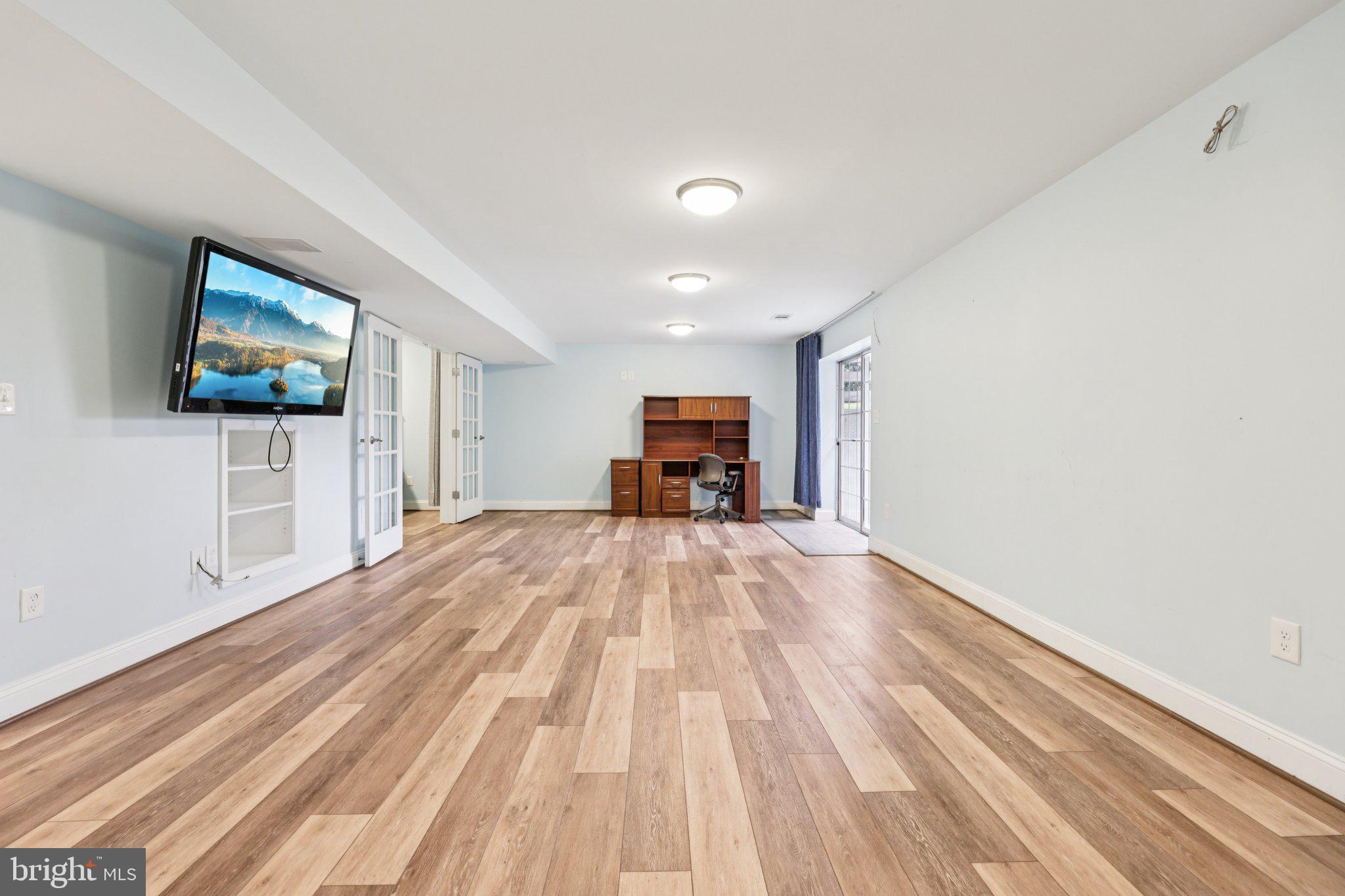 10457 Pineview Road Manassas, VA 20111 - Photo 33 of 55 a view of empty room with wooden floor