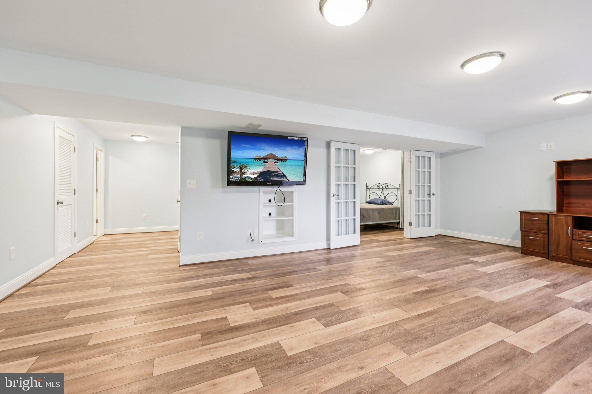 10457 Pineview Road Manassas, VA 20111 - Photo 34 of 55 a view of empty room with a kitchen and a sink
