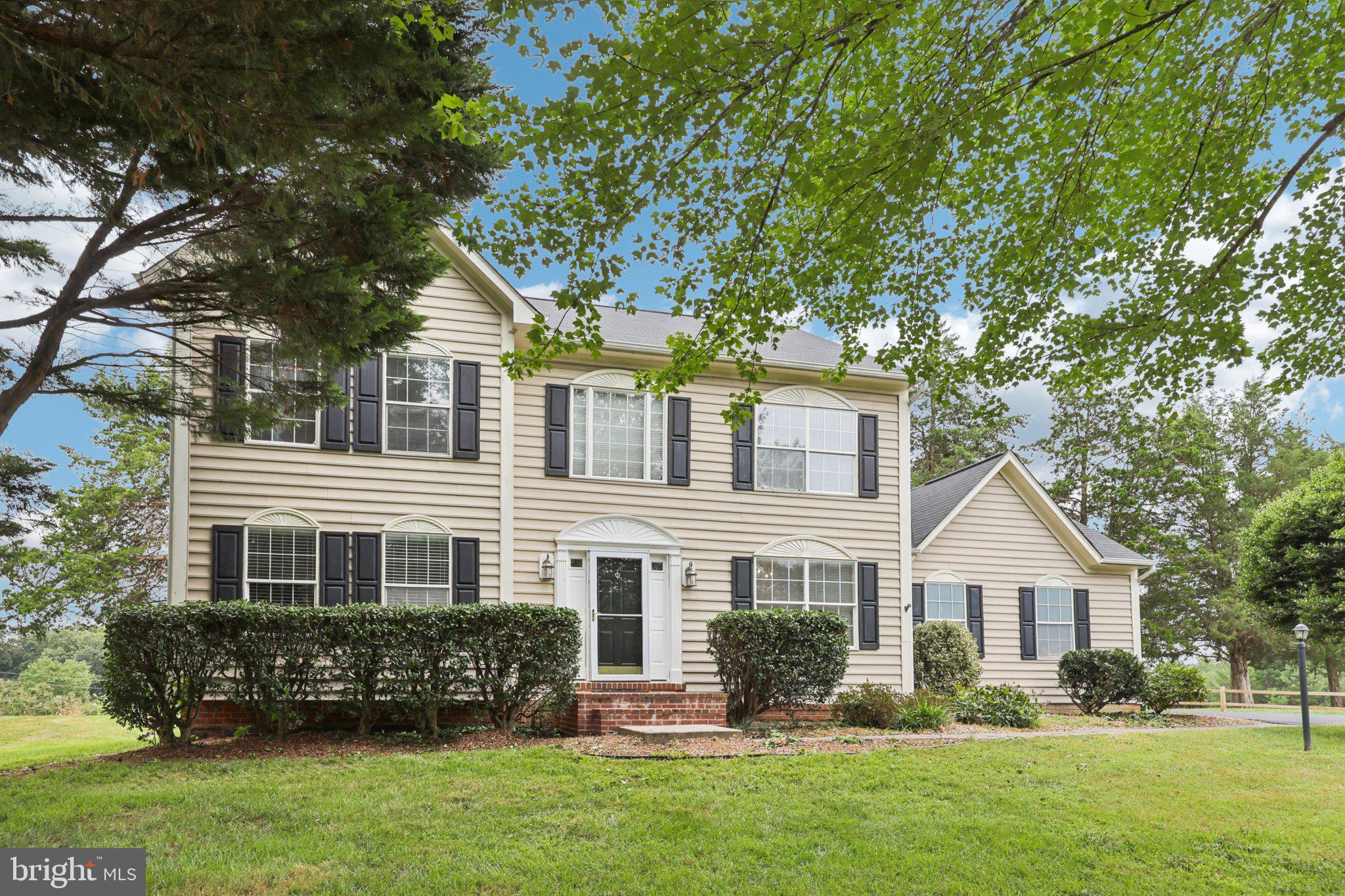 10457 Pineview Road Manassas, VA 20111 - Photo 40 of 55 front view of a house with a yard