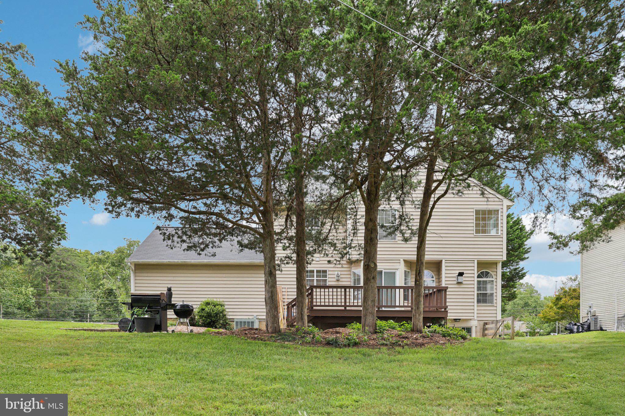 10457 Pineview Road Manassas, VA 20111 - Photo 43 of 55 a front view of house with yard and green space
