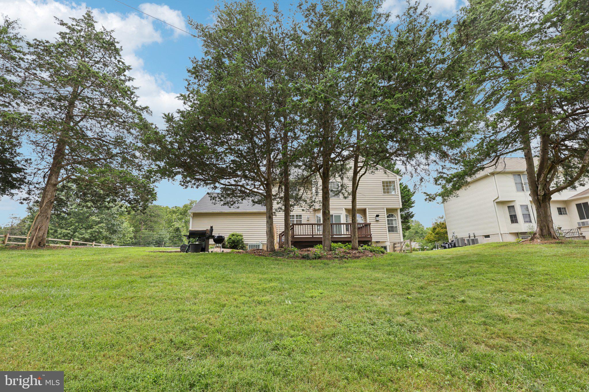 10457 Pineview Road Manassas, VA 20111 - Photo 44 of 55 a view of a house with a yard