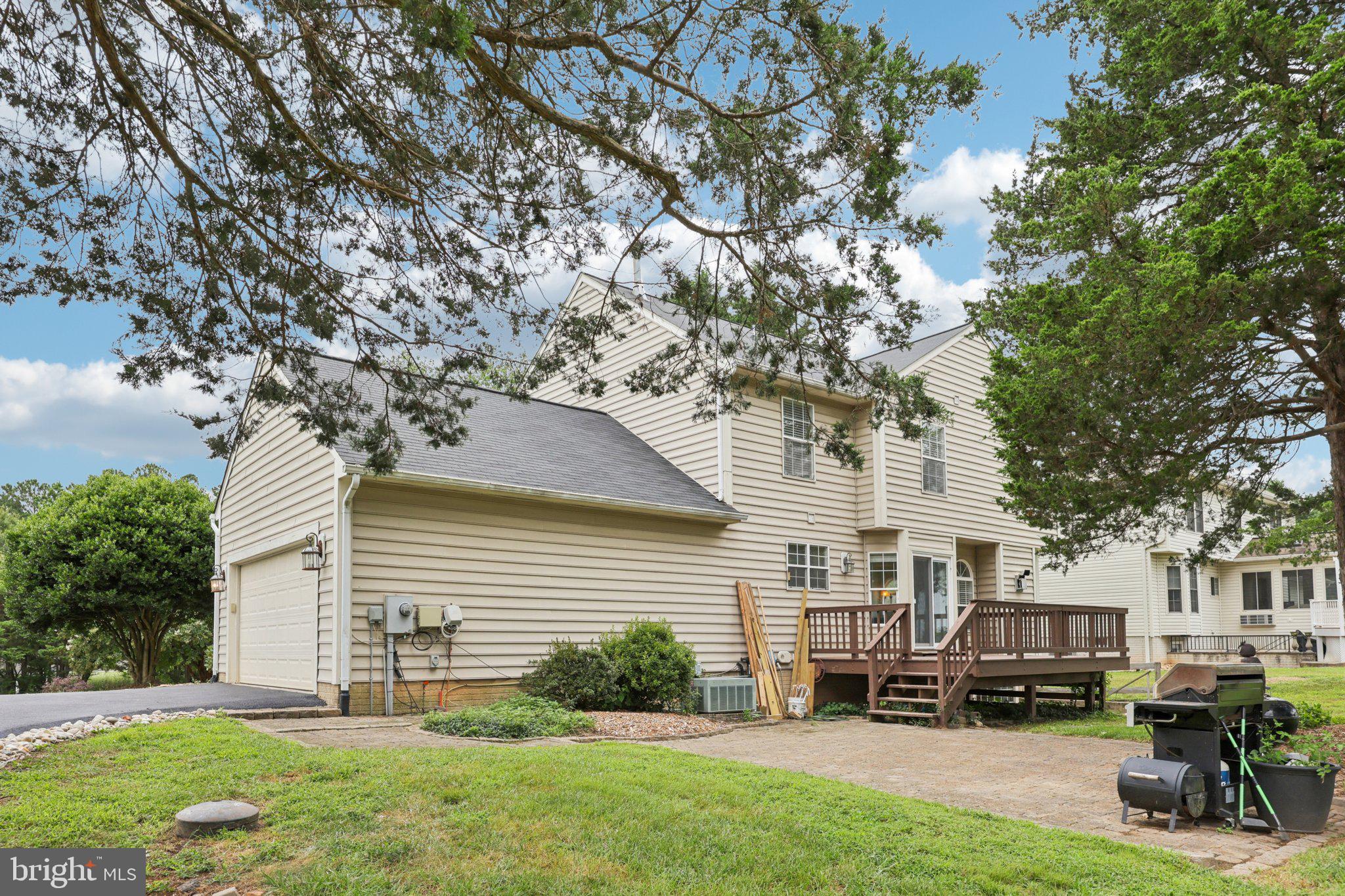 10457 Pineview Road Manassas, VA 20111 - Photo 46 of 55 a view of house with a outdoor seating