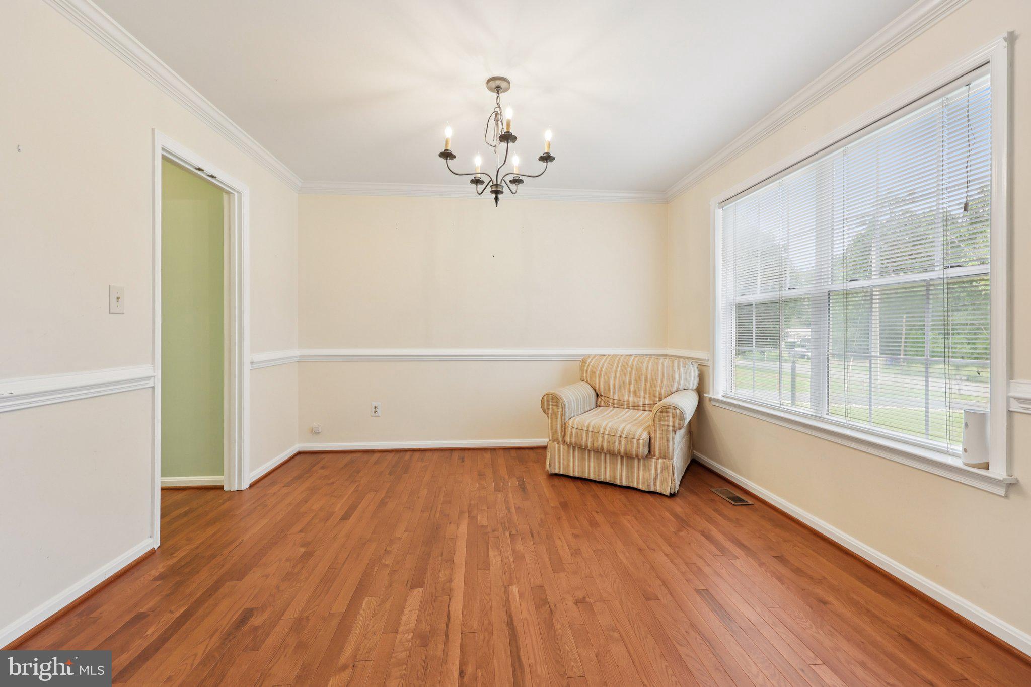 10457 Pineview Road Manassas, VA 20111 - Photo 5 of 55 a living room with furniture and wooden floor