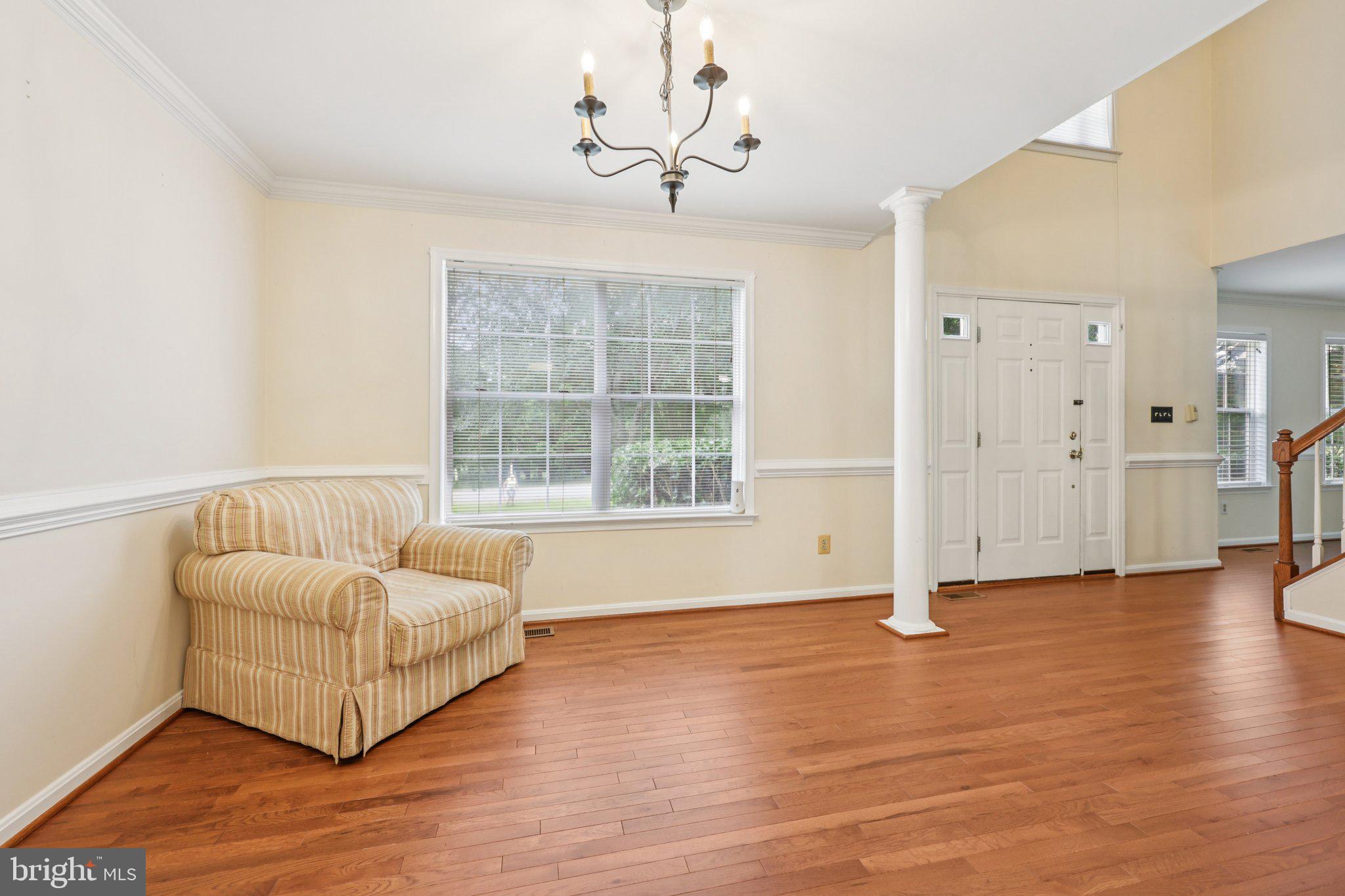 10457 Pineview Road Manassas, VA 20111 - Photo 6 of 55 a living room with furniture and a window