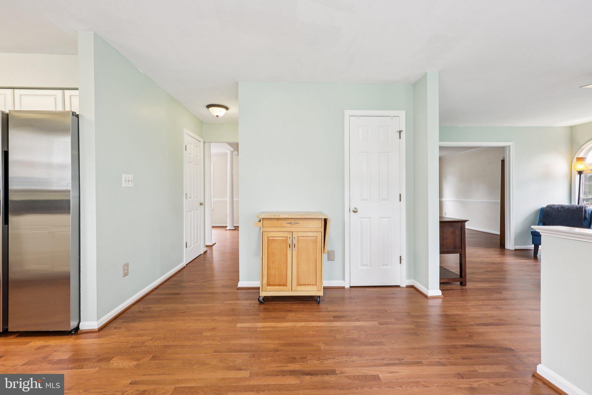 10457 Pineview Road Manassas, VA 20111 - Photo 10 of 55 a view of empty room with wooden floor