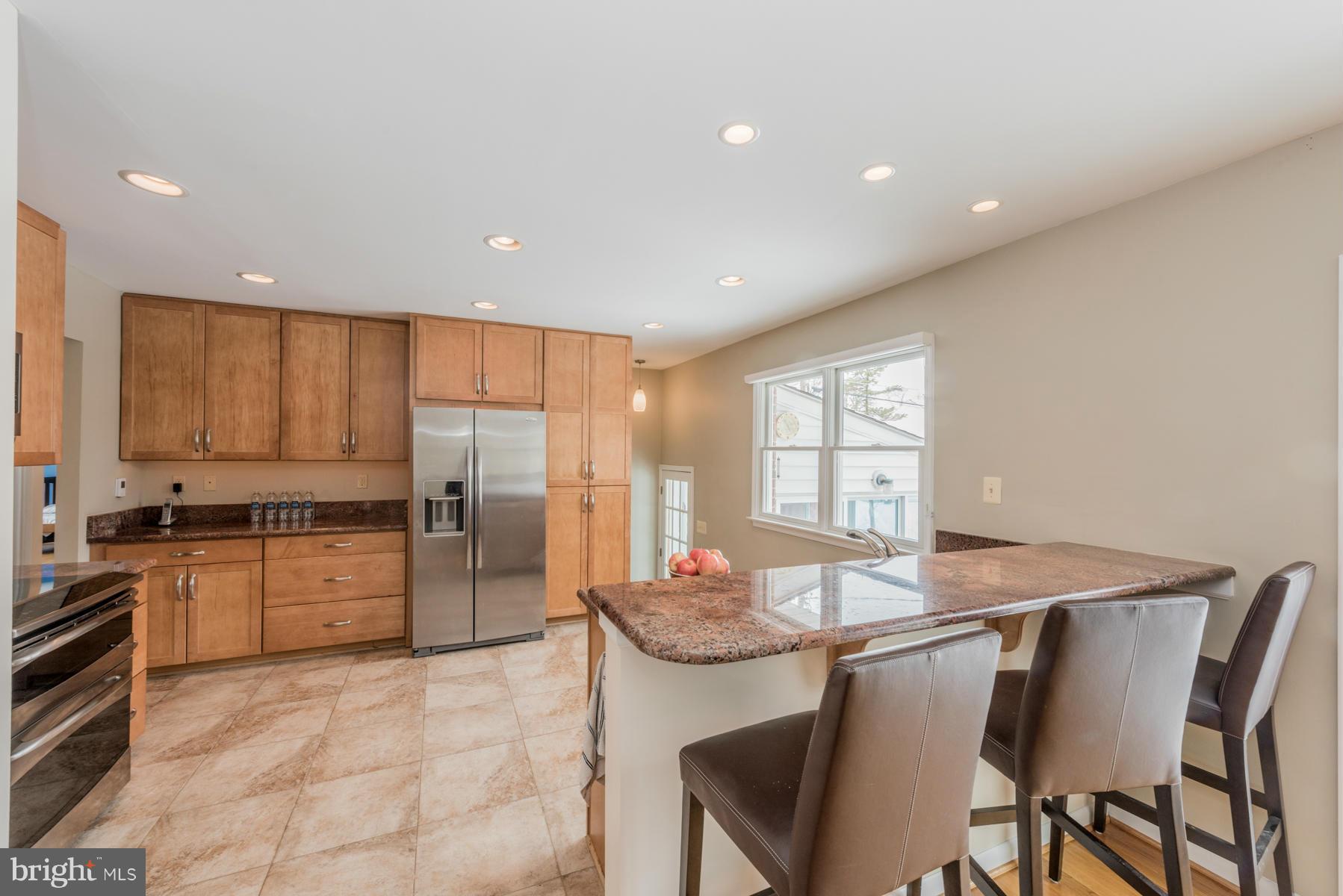 10145 Charington Road Cockeysville, MD 21030 - Photo 7 of 30 Remodeled Kitchen with Bar