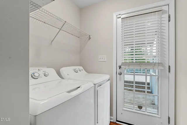 a kitchen with stainless steel appliances granite countertop a stove microwave and refrigerator