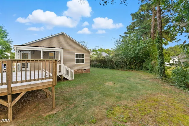 a view of a street with an ocean view