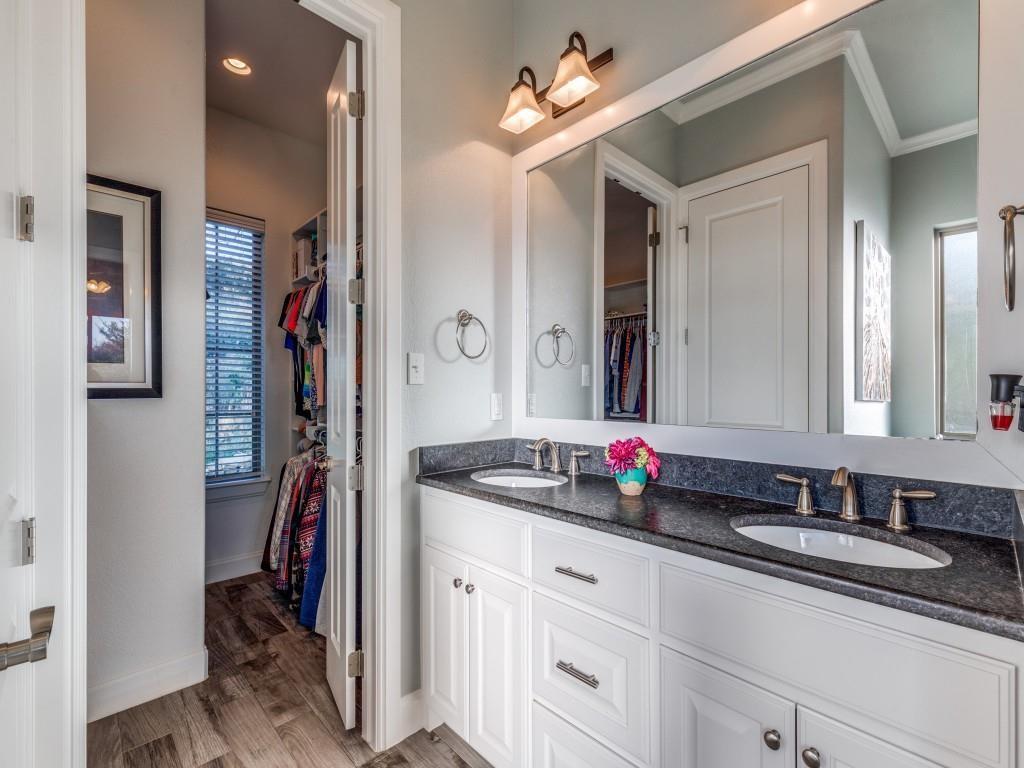 165 Cote D Azur Chico, TX 76431 - Photo 17 of 40 a bathroom with a sink double vanity and a mirror