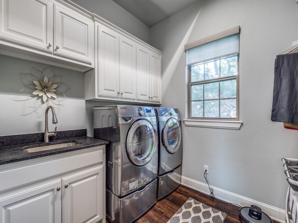 165 Cote D Azur Chico, TX 76431 - Photo 19 of 40 a view of a storage and utility room with washer and dryer
