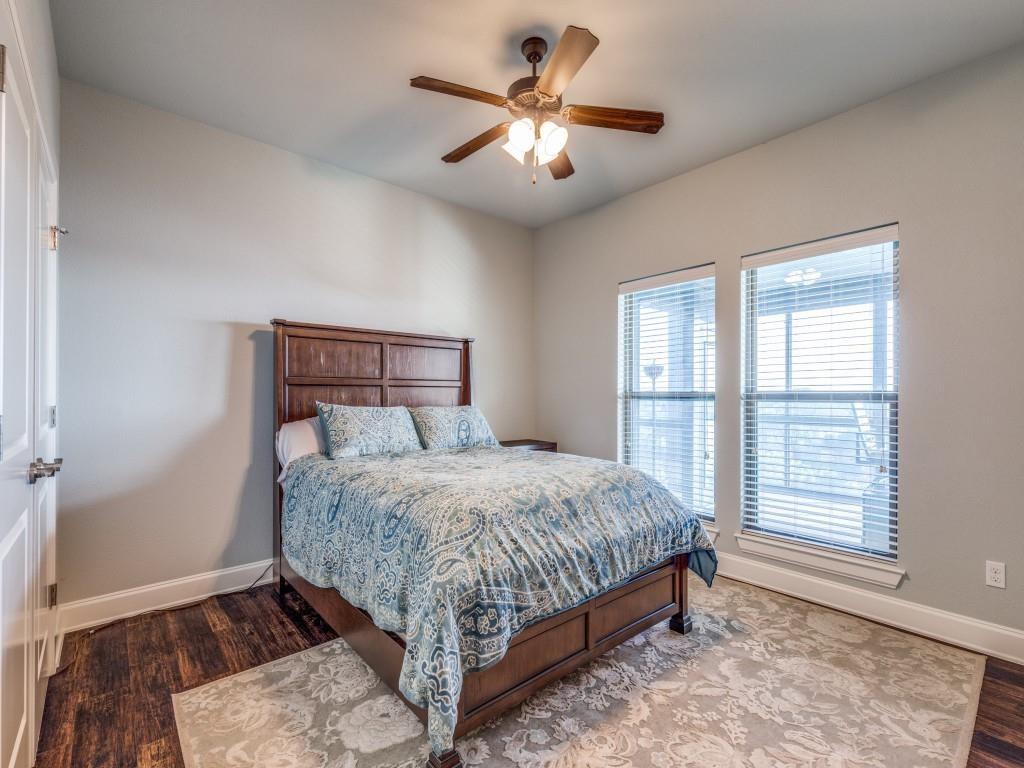165 Cote D Azur Chico, TX 76431 - Photo 21 of 40 a bedroom with a bed and a window