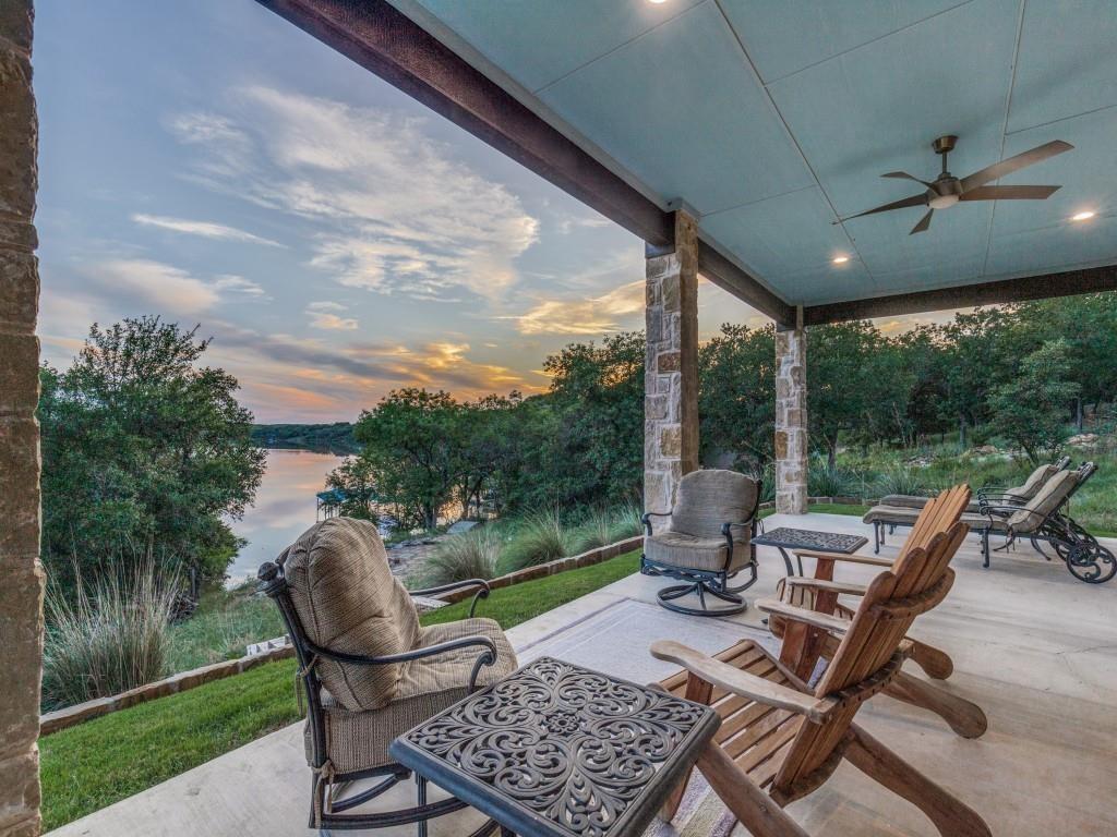 165 Cote D Azur Chico, TX 76431 - Photo 28 of 40 a view of a patio with a dining table and chairs