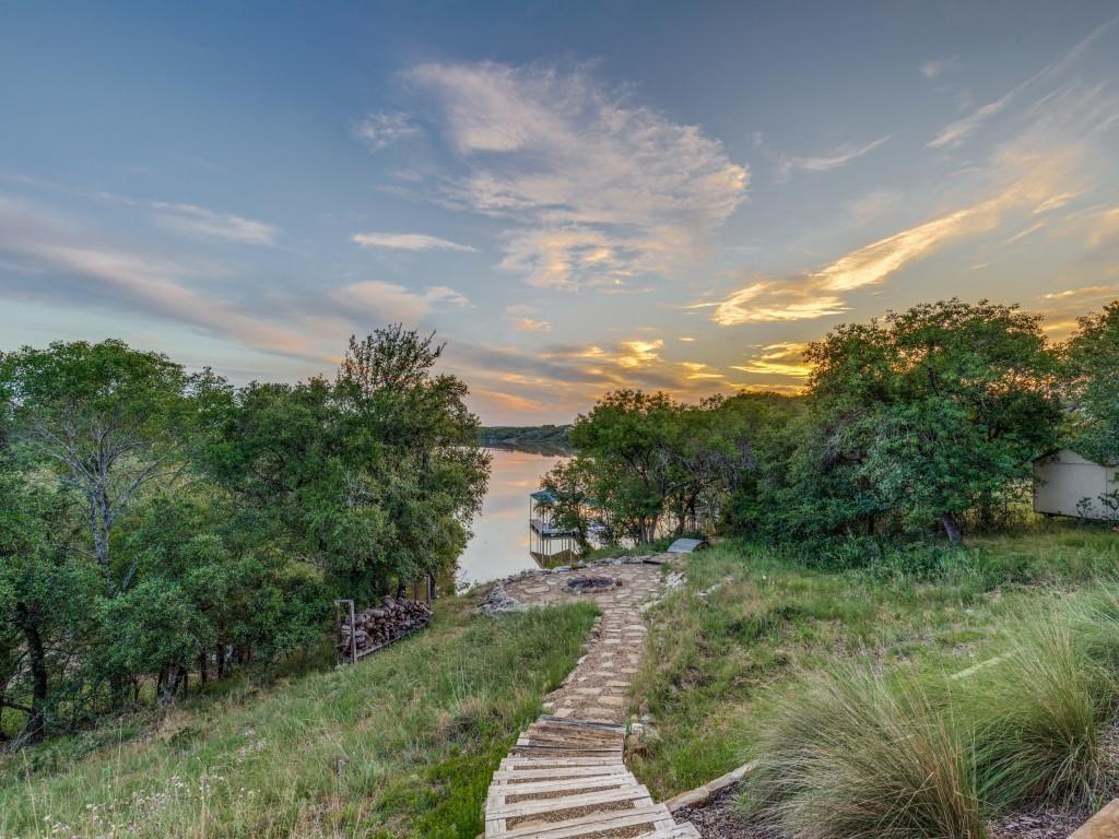 165 Cote D Azur Chico, TX 76431 - Photo 37 of 40 a view of a pathway both side of green field