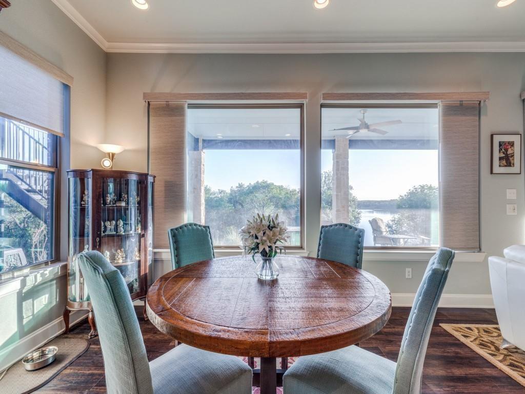 165 Cote D Azur Chico, TX 76431 - Photo 9 of 40 a view of a dining room with furniture window and wooden floor