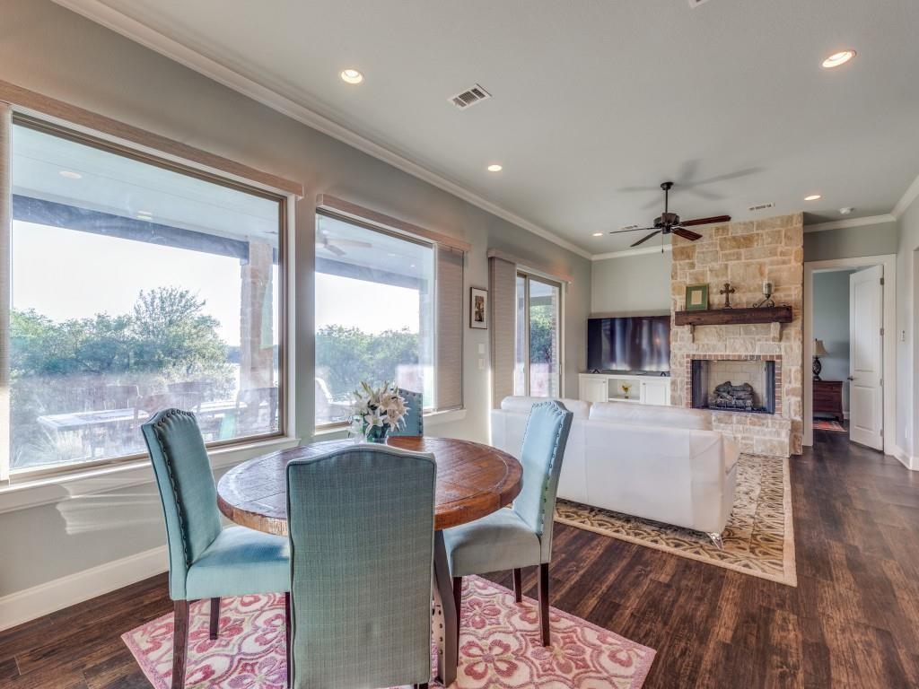 165 Cote D Azur Chico, TX 76431 - Photo 10 of 40 a view of a dining room with furniture window and wooden floor