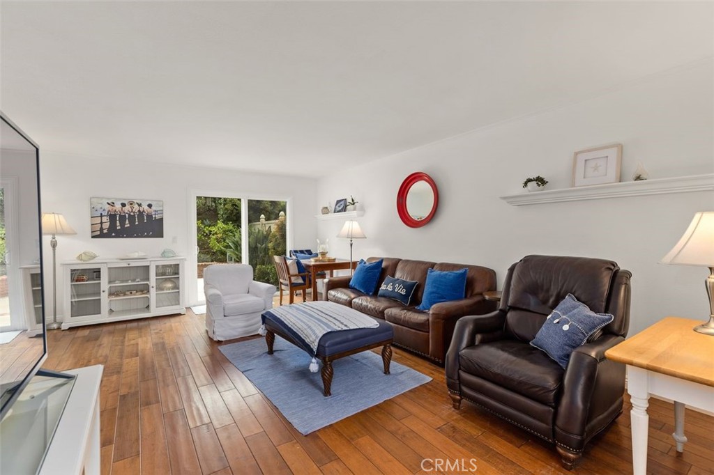 33482 Spinnaker Drive South Dana Point, CA 92629 - Photo 2 of 27 a living room with furniture and wooden floor