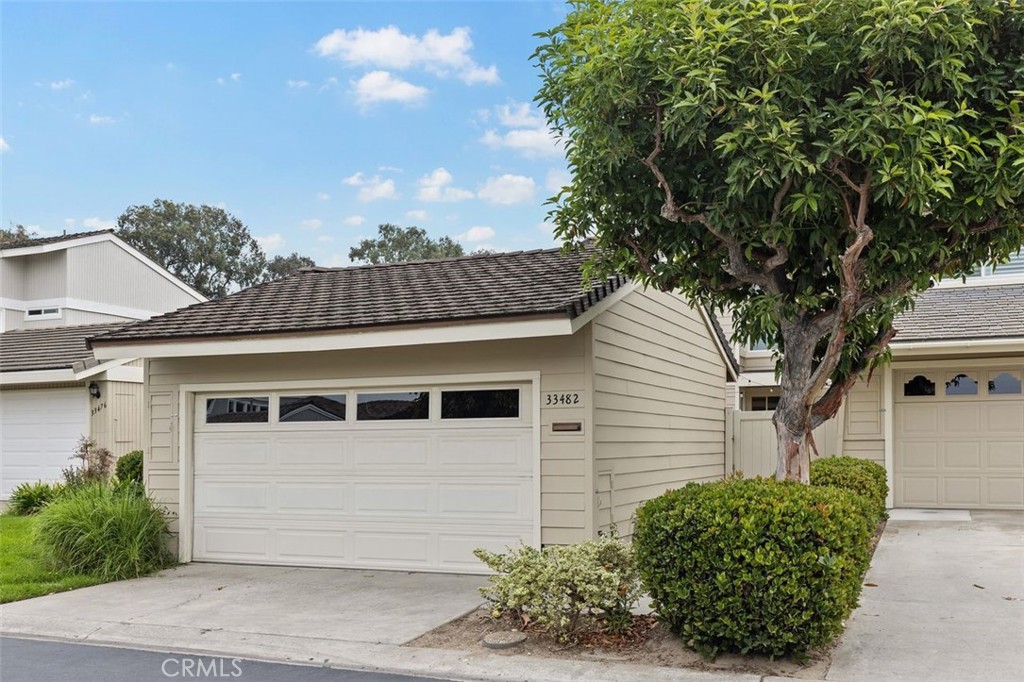 33482 Spinnaker Drive South Dana Point, CA 92629 - Photo 27 of 27 a front view of a house with garden