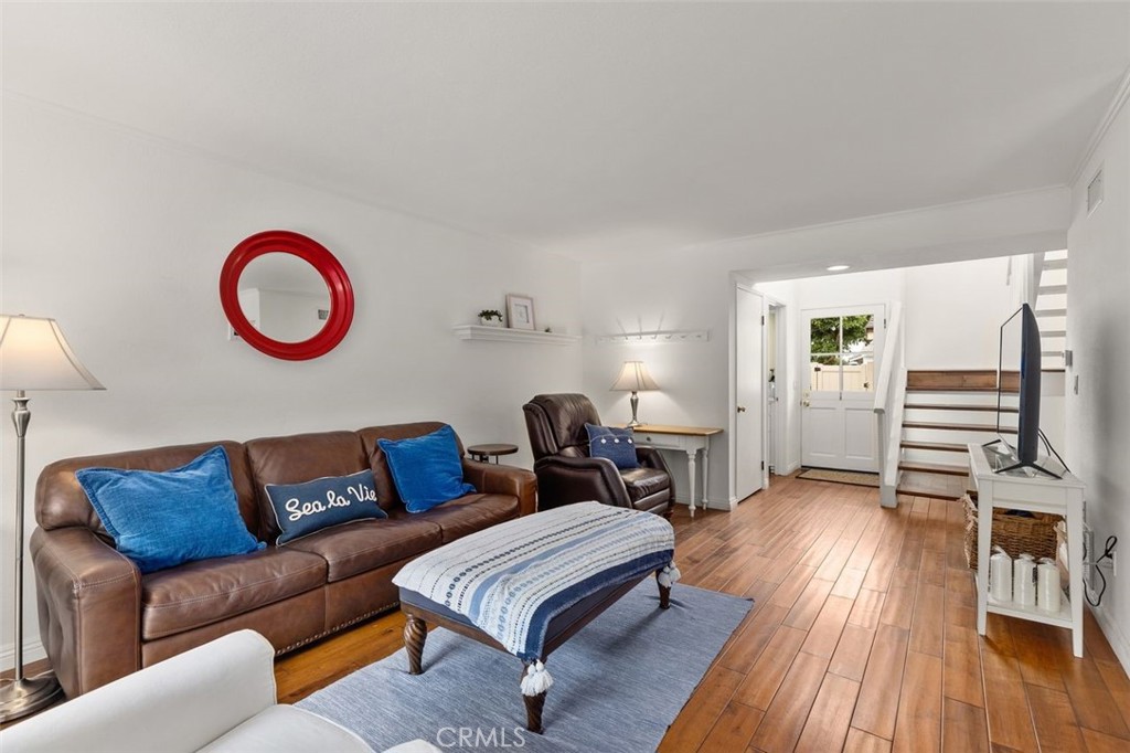 33482 Spinnaker Drive South Dana Point, CA 92629 - Photo 3 of 27 a living room with furniture and a wooden floor
