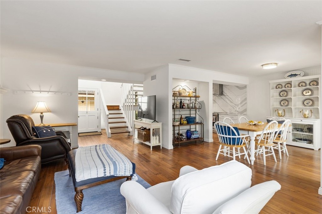 33482 Spinnaker Drive South Dana Point, CA 92629 - Photo 4 of 27 a living room with furniture and wooden floor