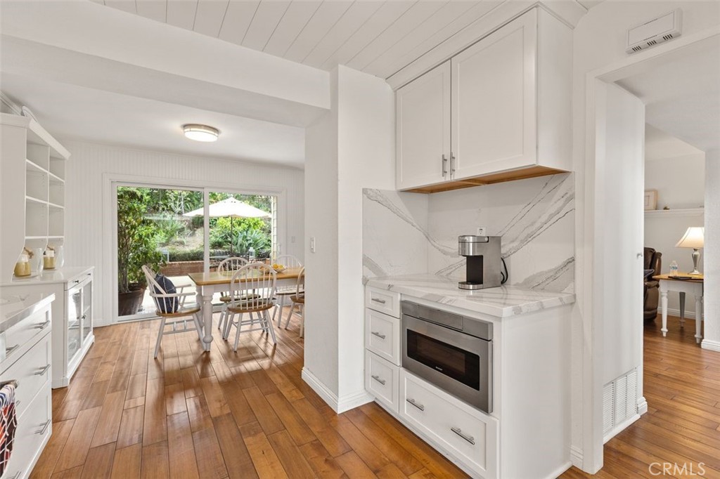 33482 Spinnaker Drive South Dana Point, CA 92629 - Photo 10 of 27 a living room with furniture and a fireplace
